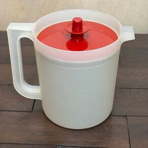 Vintage Tupperware Pitcher 1.5 quart sheer with red push-button sealing lid